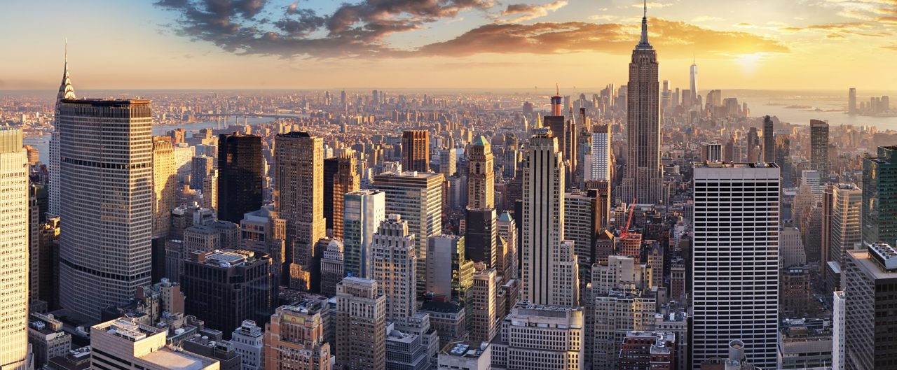 New York City skyline with the empire state building at sunset