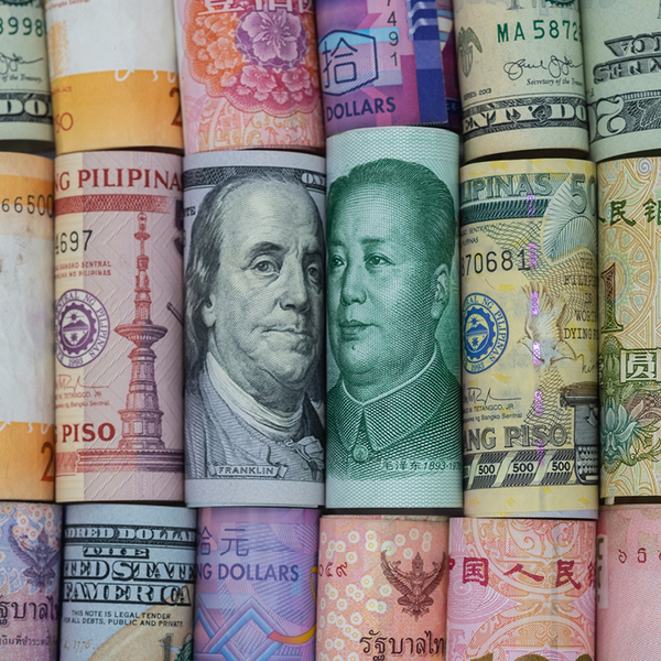 Rolled up bank-notes from various countries