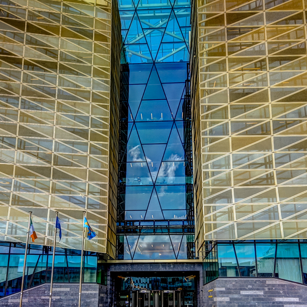Modern architecture of the Central Bank of Ireland along the Liffey River in Dublin Ireland