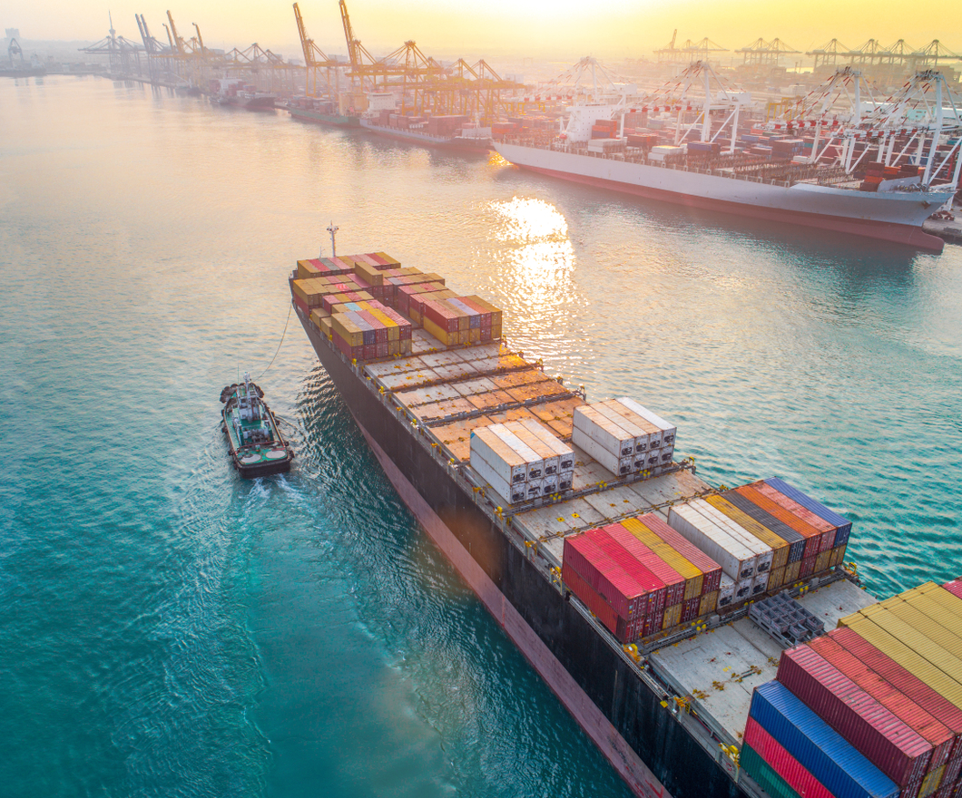 Shipping Containers on Ship Vessel in the Water 