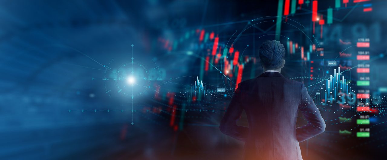 Investor, businessman analysing stock market indicators