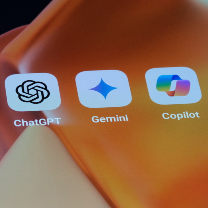 ChatGPT and Microsoft Copilot app icons on screen. Assorted AI mobile apps