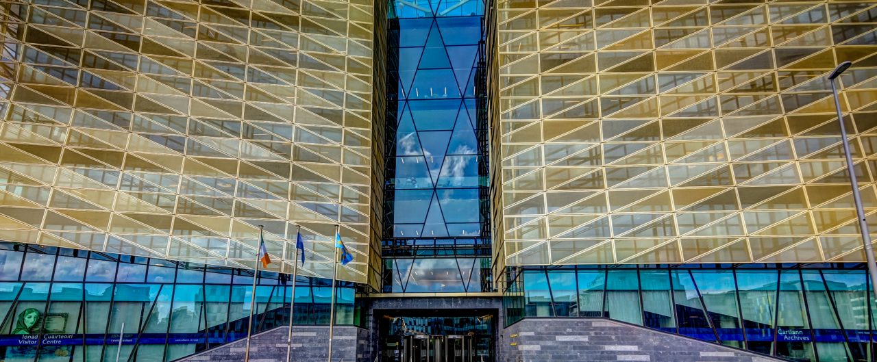 Modern architecture of the Central Bank of Ireland along the Liffey River in Dublin Ireland